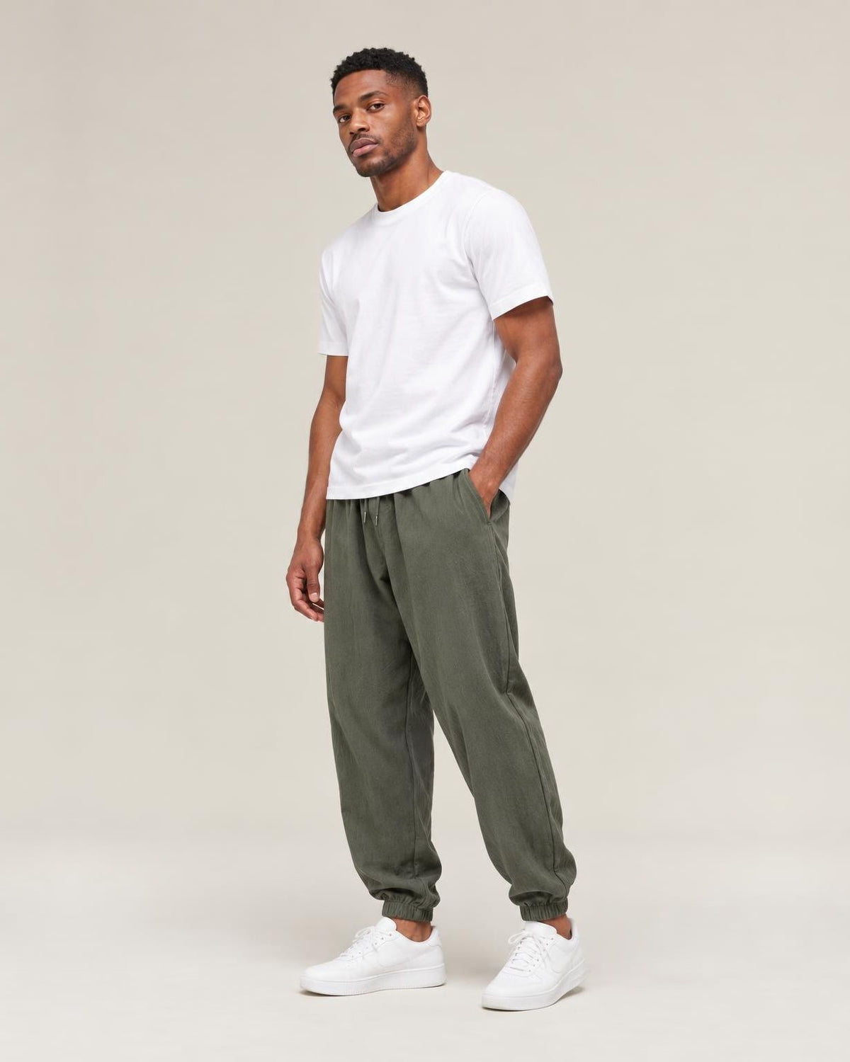 Asa Linen Ankle Pants in Green, full-length front view