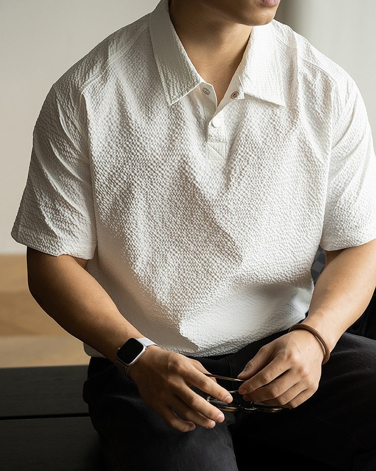 Awa Seersucker Polo Shirt in White, full-length front view