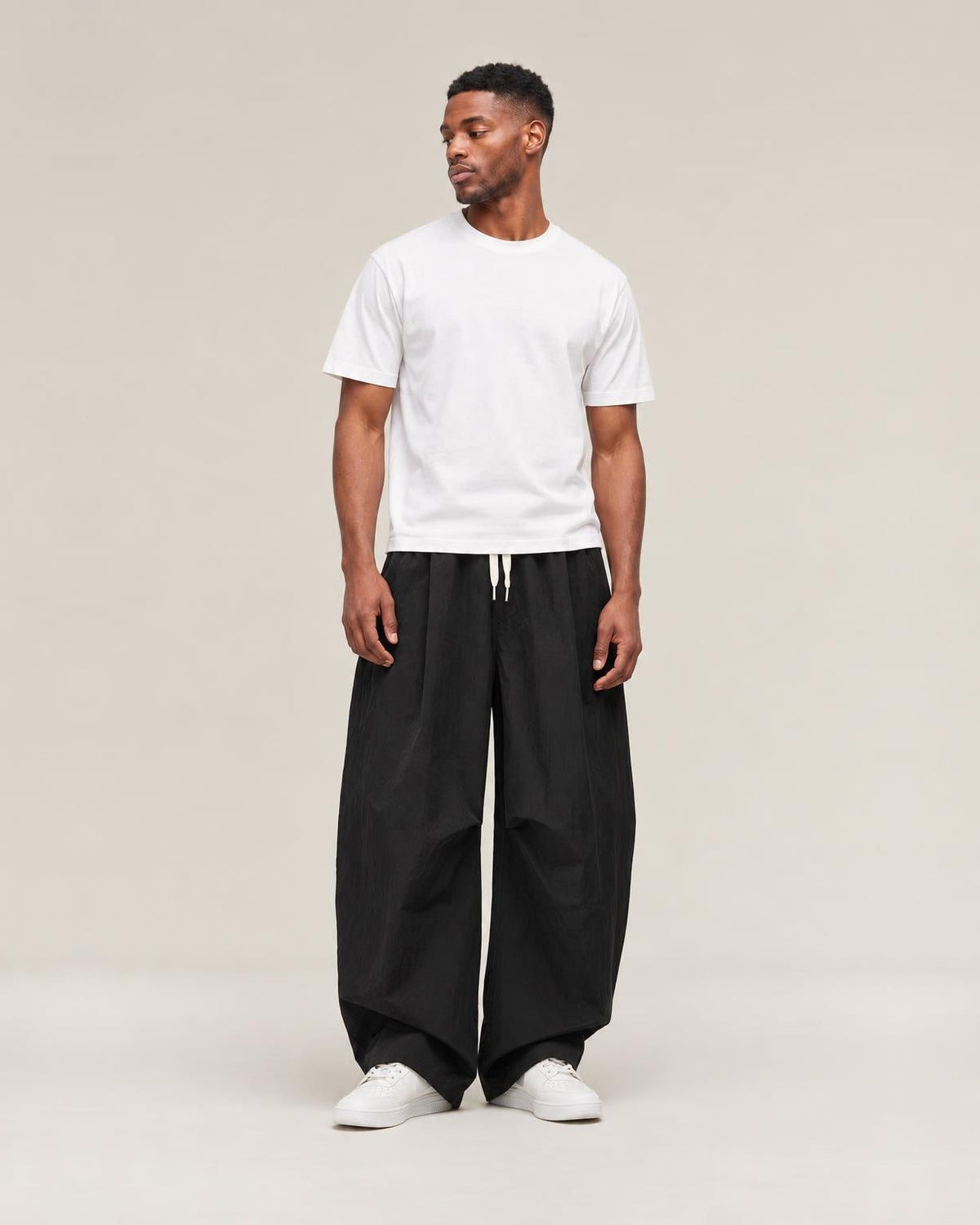 Hanami Wide-Leg Pants in Black, full-length front view