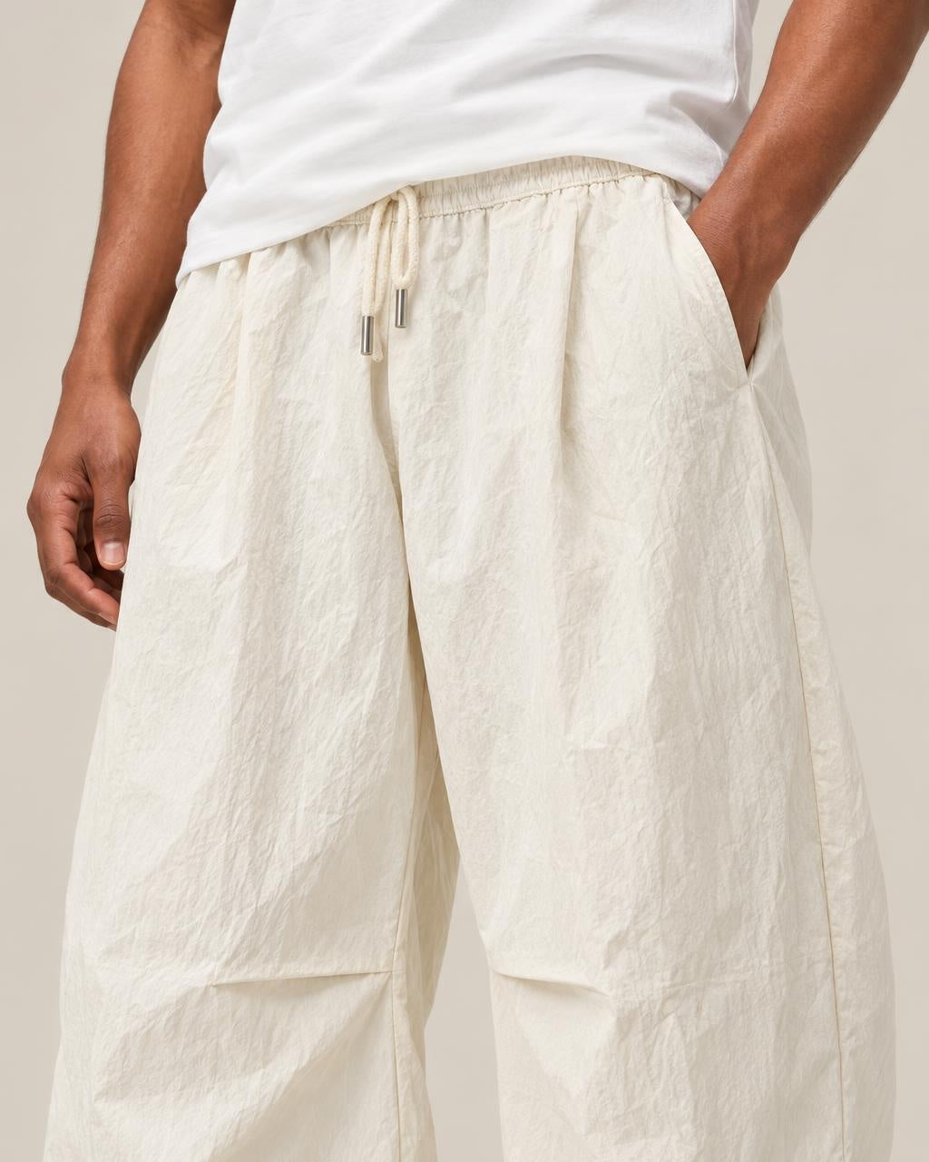 Hanami Wide-Leg Pants in White, close-up on the model