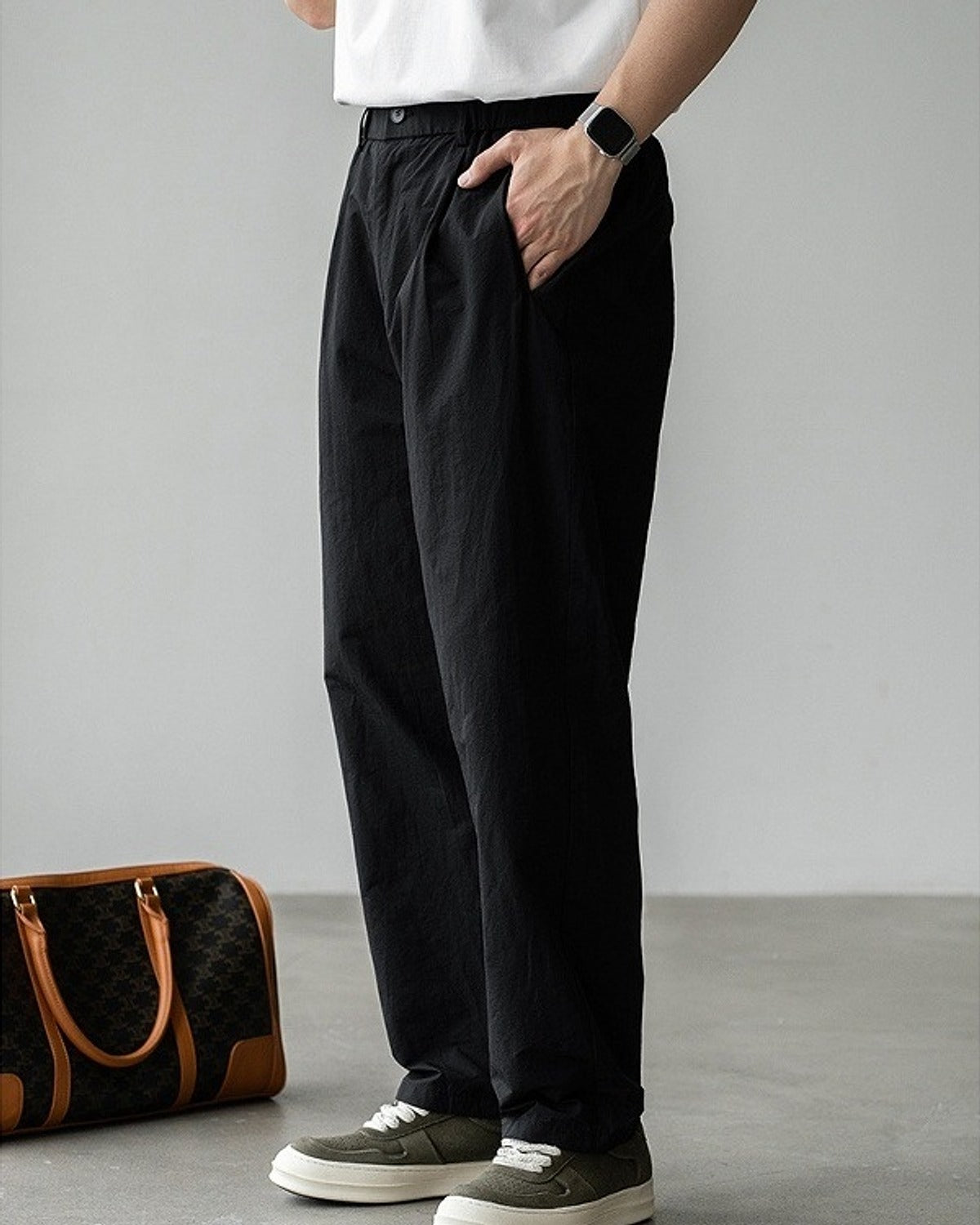 Momi Crinkle Harem Pants in Black, full-length front view