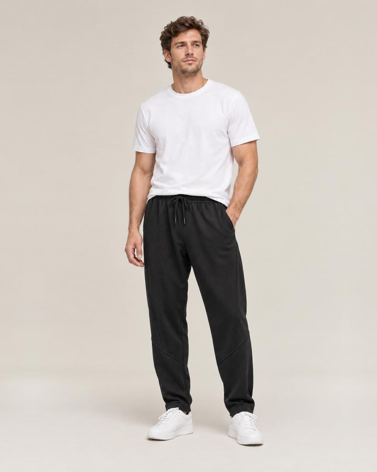 Nobi Relaxed Harem Pants in Black, full-length front view