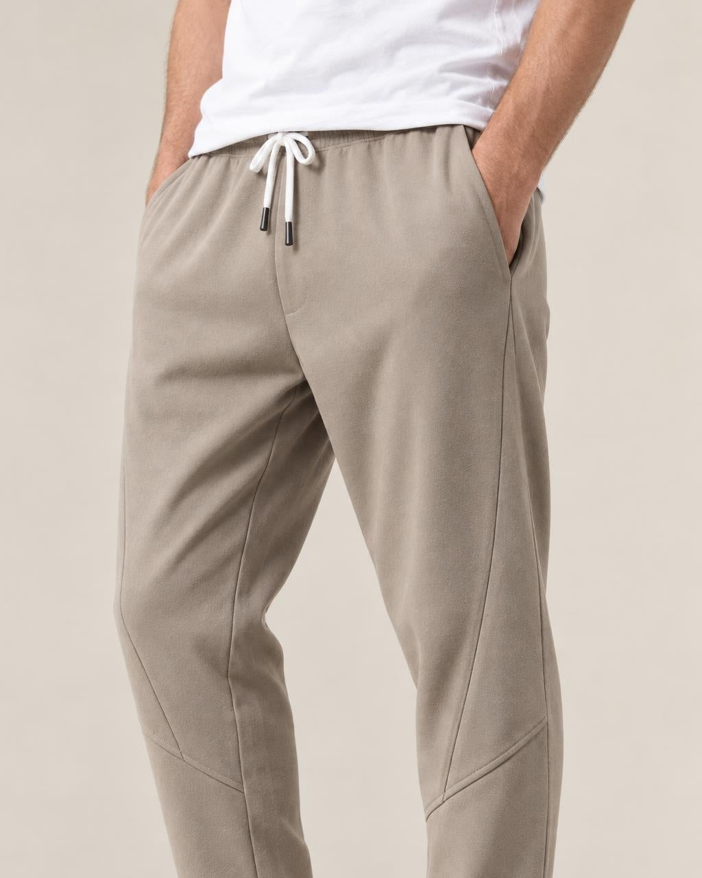 Nobi Relaxed Harem Pants in Khaki, close-up on the model