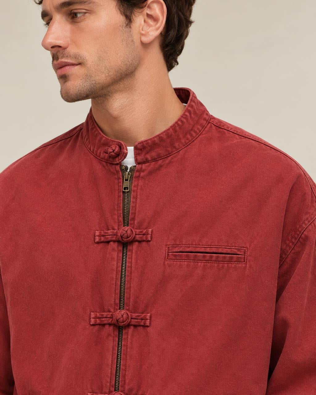 Shokunin Stand Collar Work Jacket in Burgundy, close-up on the model
