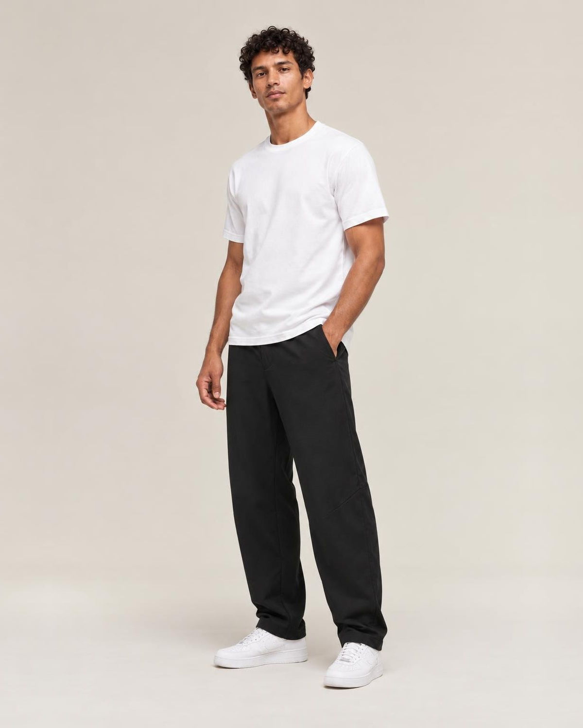 Yuru Loose Harem Pants in Black, full-length front view
