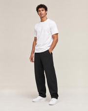 Yuru Loose Harem Pants in Black, full-length front view